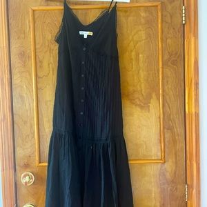 Black and strappy maxi dress with lace details